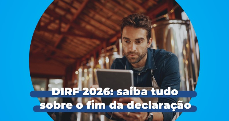 Pessoa utilizando um tablet em um ambiente industrial com estruturas metálicas ao fundo, acompanhada do título ‘DIRF 2026: saiba tudo sobre o fim da declaração’ em destaque sobre a imagem.