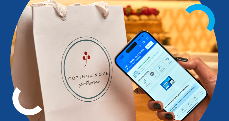 Sacola da Cozinha Nove Pâtisserie ao lado de celular na tela inicial do App Cielo Gestão.