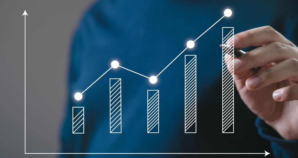 Gráfico de barras em crescimento representando o resultado positivo de uma boa gestão financeira, com foco em lucros e indicadores de desempenho do negócio.