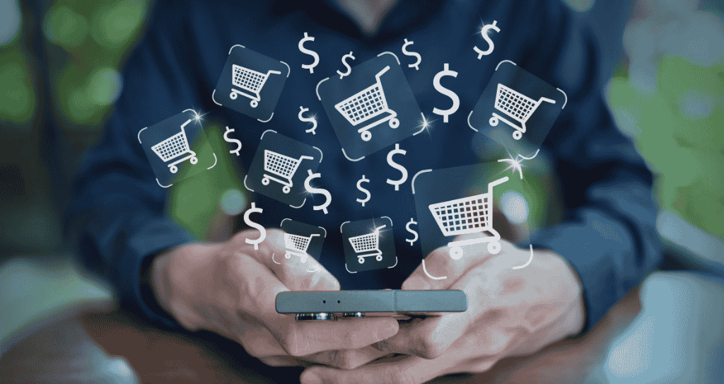 Homem utilizando celular para fazer compras com checkout de pagamento, enquanto ícones digitais de compras e valores financeiros saem da tela.