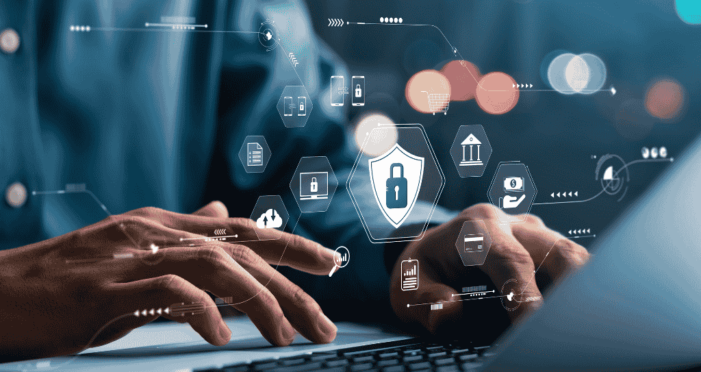 Detalhe de mãos utilizando notebook para processos de segurança em pagamentos digitais, enquanto vários ícones representando tecnologias de pagamento e segurança flutuam ao redor.